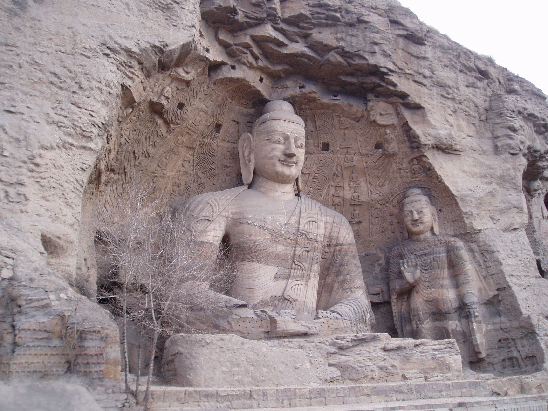 photo of statues of Buddha