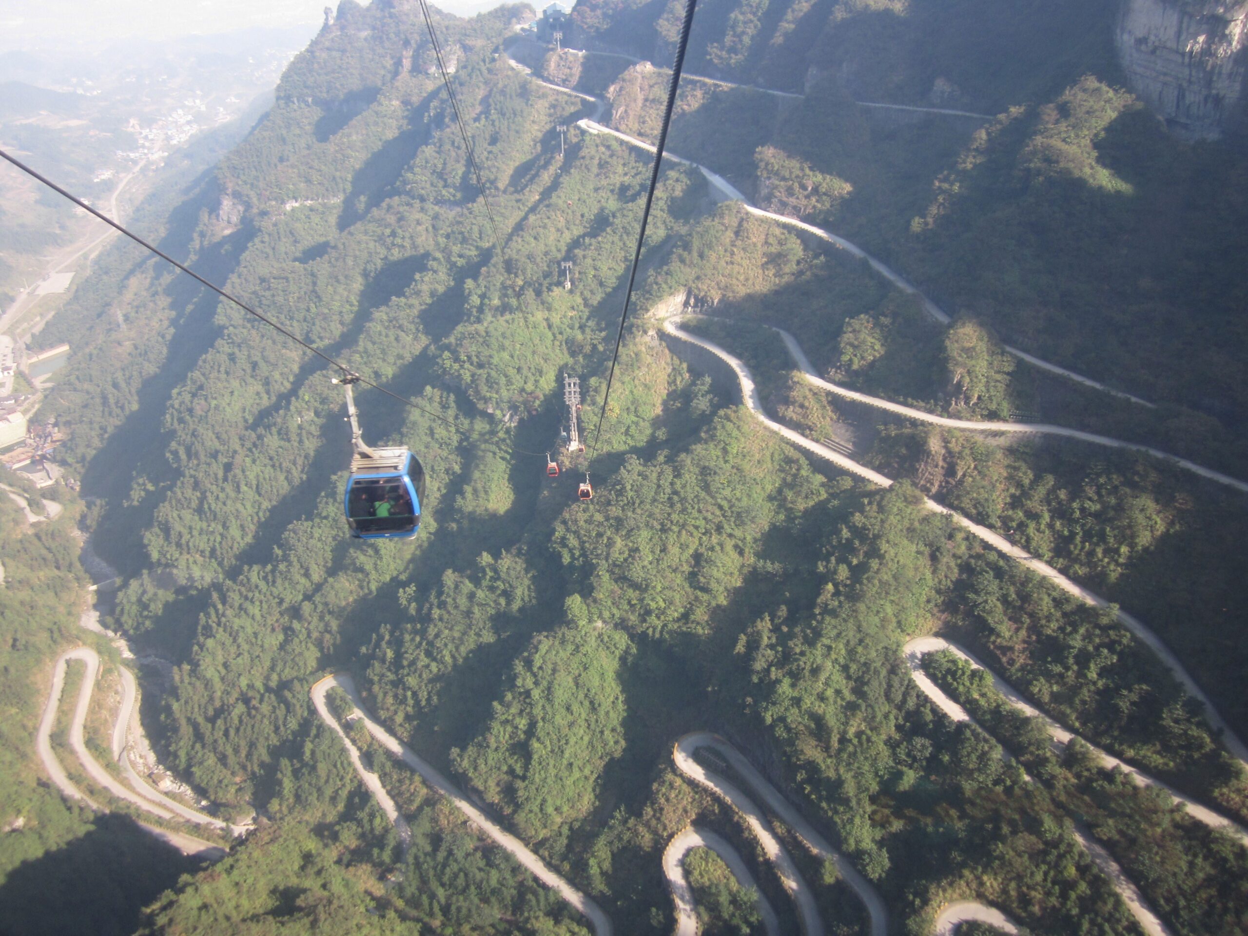 Private one day Zhangjiajie Tianmen moutain and Tujia folk park tour — ROOYEE curated journey in China